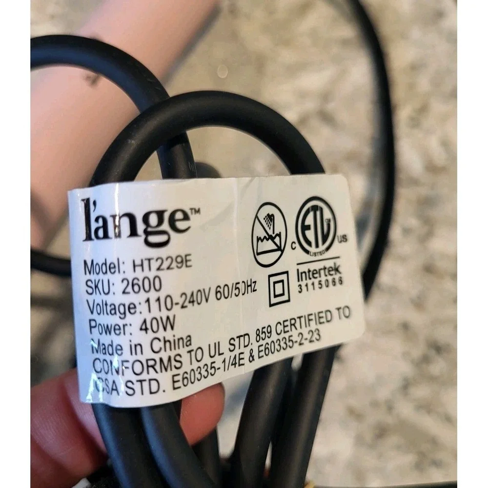 Lange Le Pirouette Rotating Curling Iron Model HT229E
